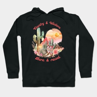 Country and western; west; country; music; cowgirl; country girl; gal; desert; landscape; vintage; retro; Nashville; cowboy; wild west; rodeo; boots; cowgirl boots; sunset; sky; born and raised; cactus; Hoodie